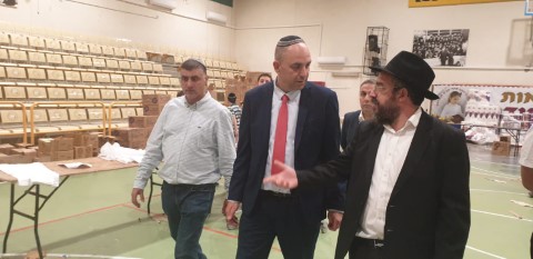 ארגון 'יחד למענכם' בלוד ערך בפסח מכירת מוצרים במחירים מסובסדים שחולקו לעשרות משפחות